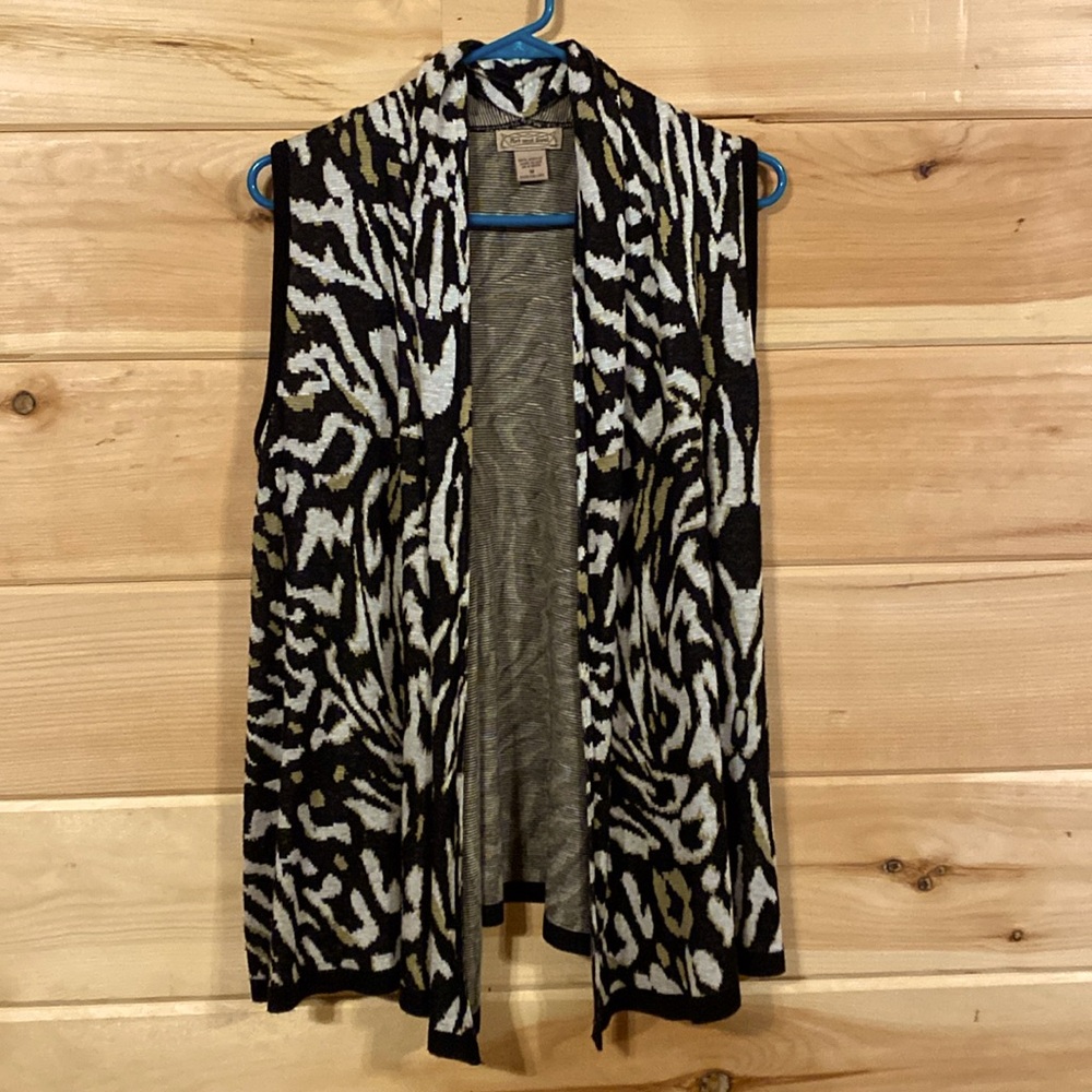 Art and Soul sweater vest $12. Medium animal print